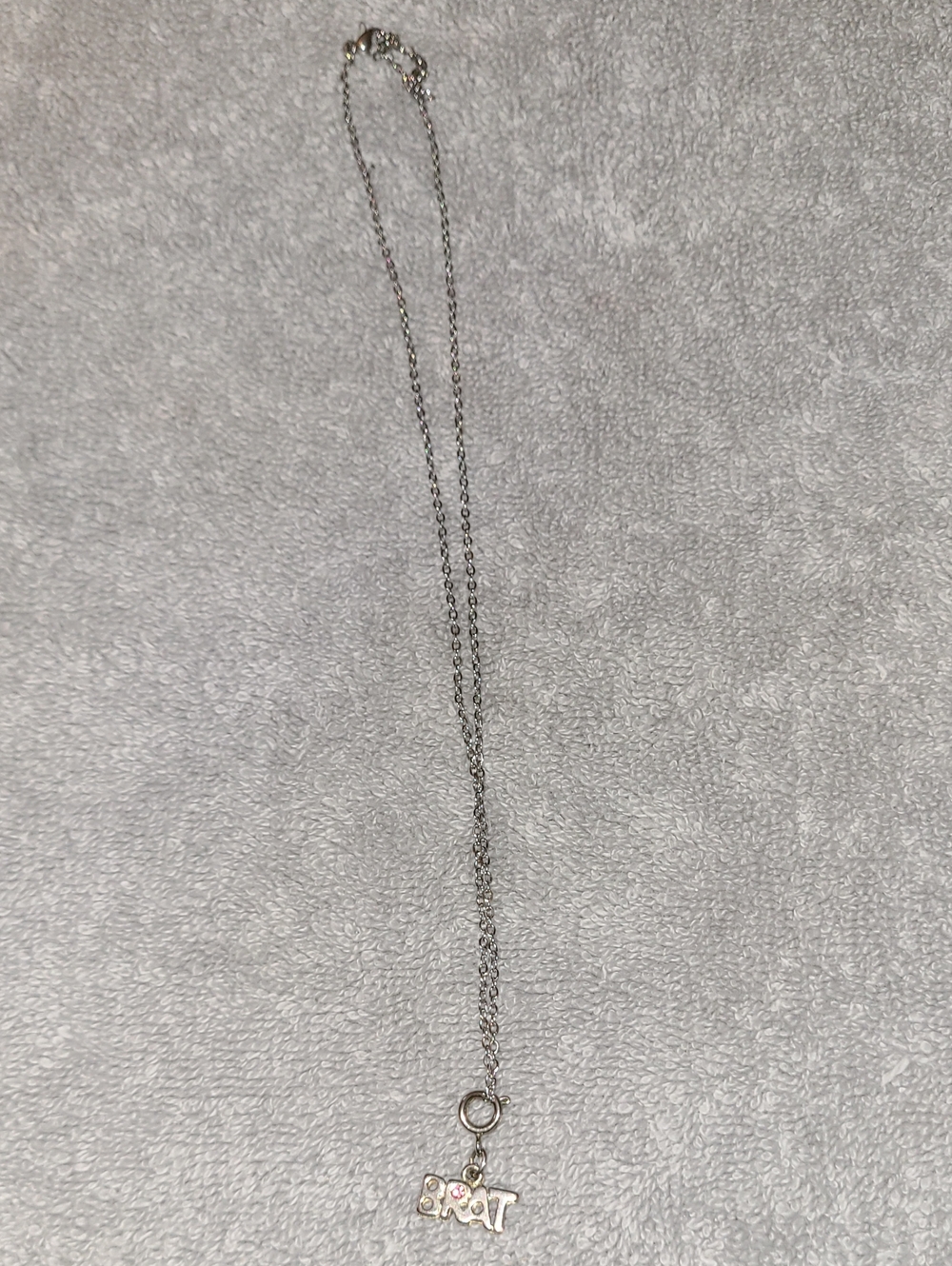 Cute Silver 'Brat' Charm Necklace with Crystal Accent
